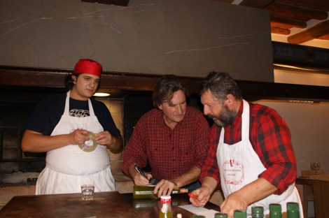 John Roche signing our bottle of olive oil